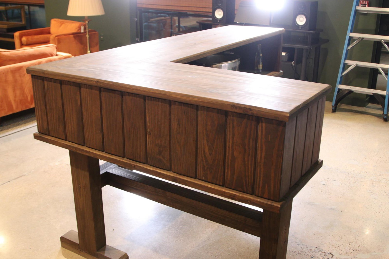 WOOD BAR: WOOD BAR L SHAPE. 44"h x 85"w x 55"d.