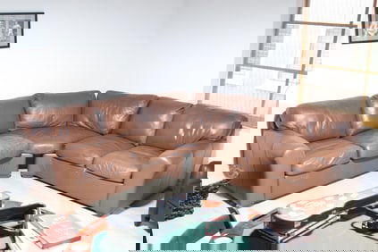 BROWN LEATHER SECTIONAL/AMERICAN LEATHER CO.