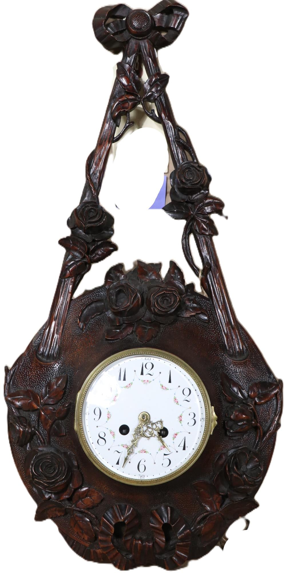 19th CENTURY LOUIS XVI STYLE WALNUT CARTEL CLOCK: 19th CENTURY LOUIS XVI STYLE CARVED WALNUT CARTELCLOCK. Height: 25 in. by Width: 11 in. by Depth: 4 in
