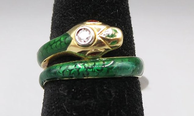 A DIAMOND & ENAMEL SNAKE MOTIF RING (1 of 3)