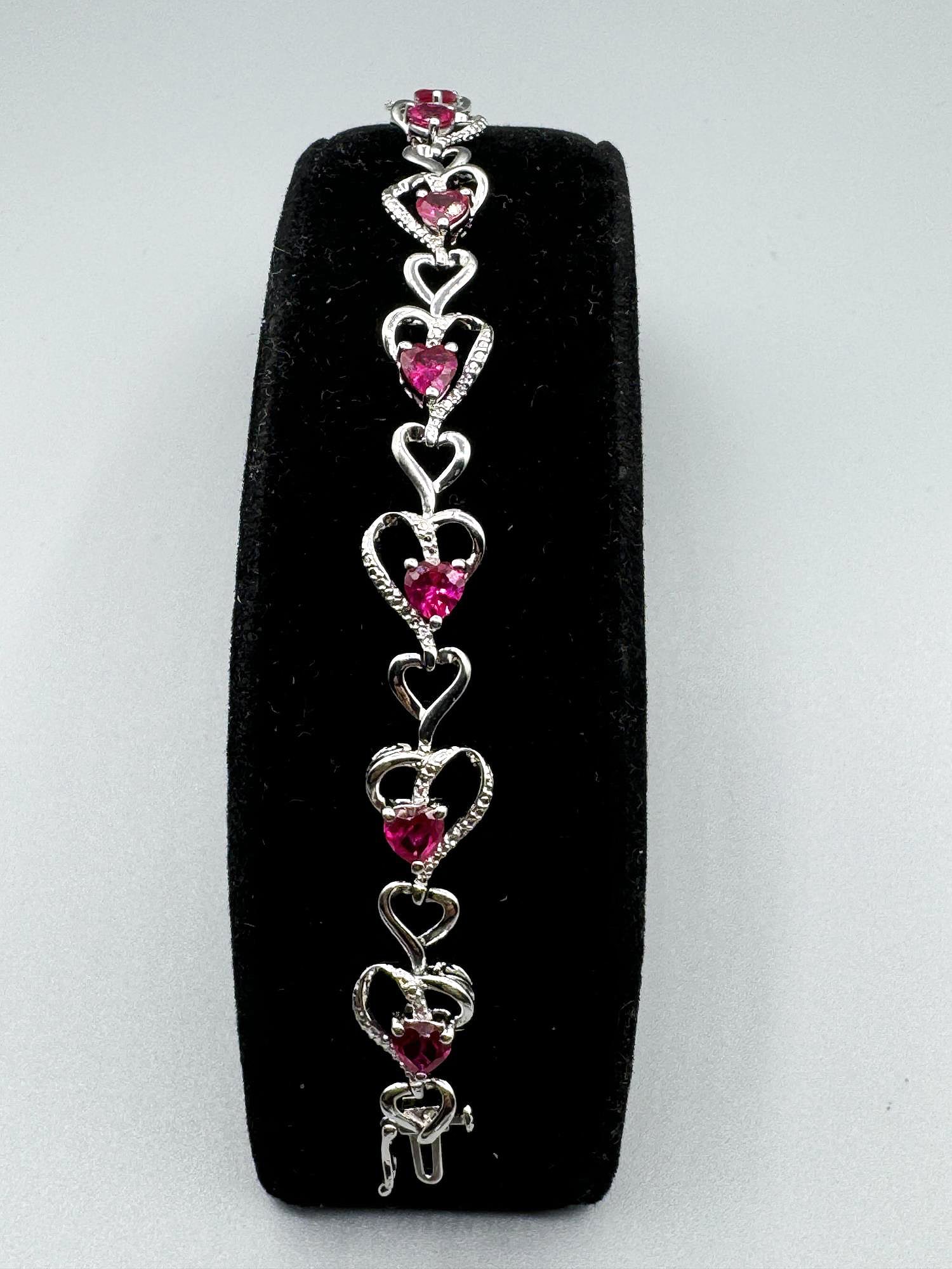 STERLING TENNIS BRACELT WITH HEART SHAPE RUBIES (1 of 2)