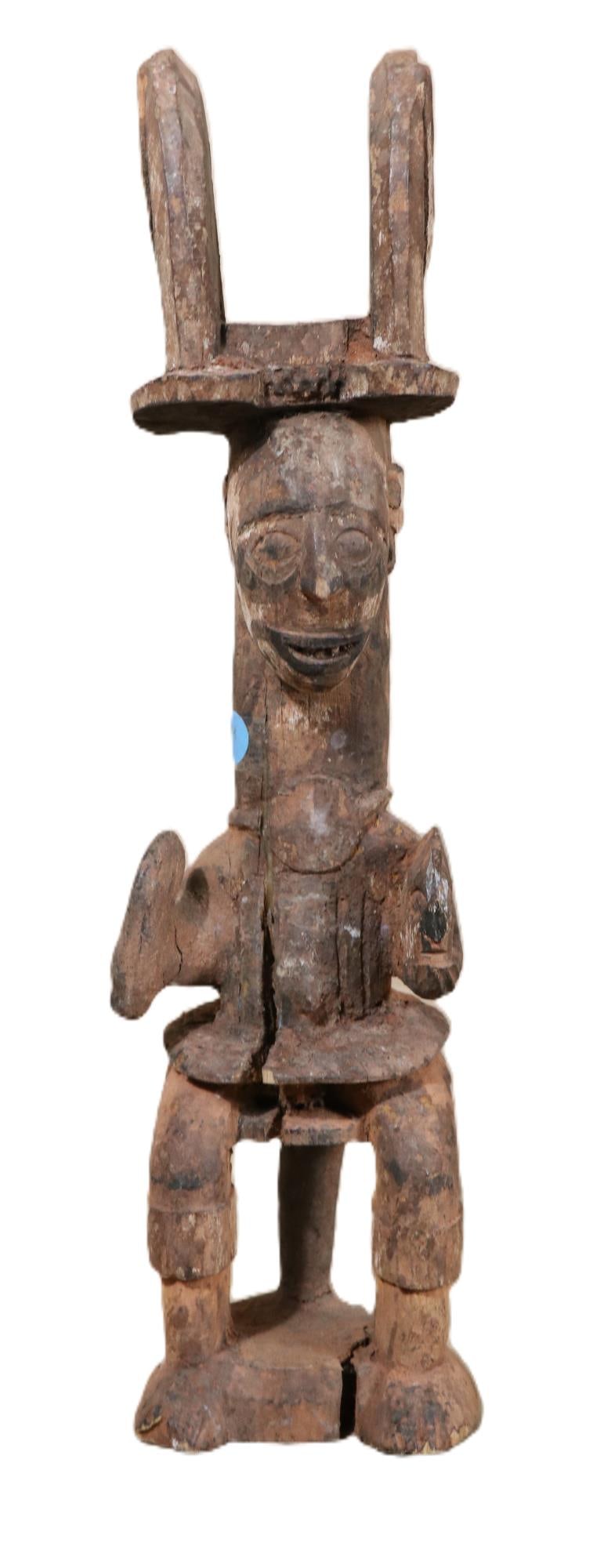 19th C. IKENDA CERMONIAL FIGURE, IBU, NIGERIA: 19th CENTURY IKENDA CERMONIAL FIGURE, IBU, NIGERIA. Height: 18.5 in. by Width: 4.5 in. by Depth: 5 in.