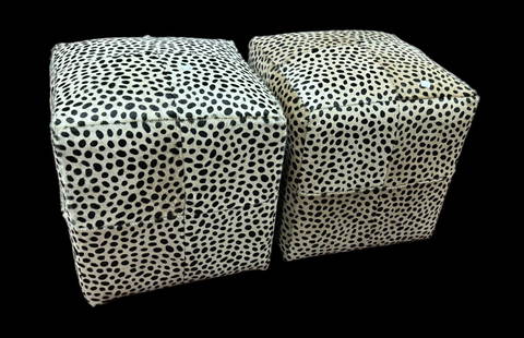PAIR OF LEOPARD STENCILED COWHIDE OTTOMANS: PAIR OF LEOPARD STENCILED COWHIDE OTTOMANS. Height: 19 in. by Width: 17 in. by Depth: 17