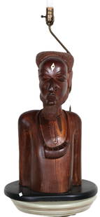 CARVED AFRICAN HEAD NOW A LAMP: CARVED AFRICAN HEAD NOW A LAMP. Height: 29 in. by Width: 14 in. by Depth: 12 in.