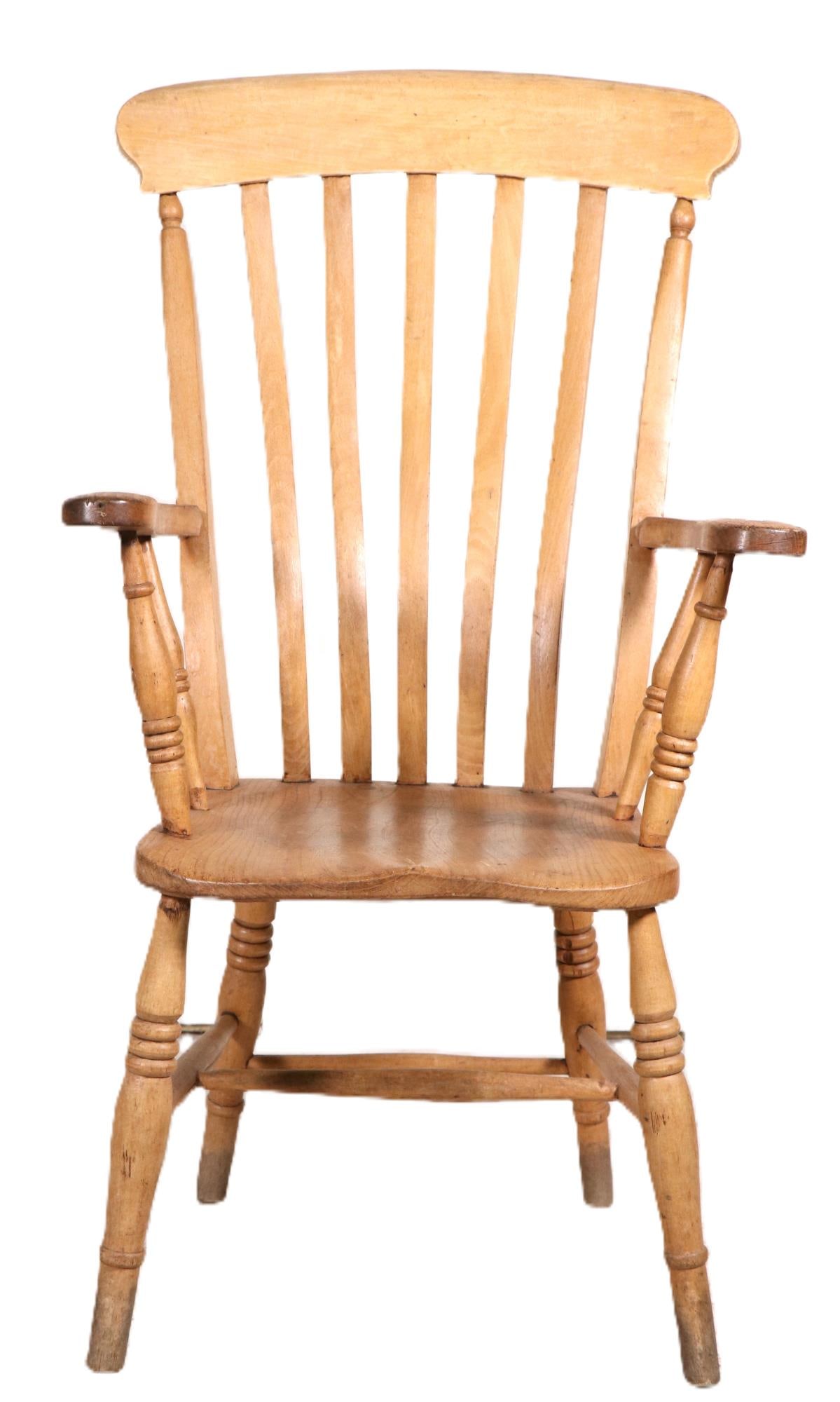 PAIR OF PINE WINDSOR ARMCHAIRS: PAIR OF PINE WINDSOR ARMCHAIRS. Height: 44.5 in. by Width: 23 in. by Depth: 19 in.
