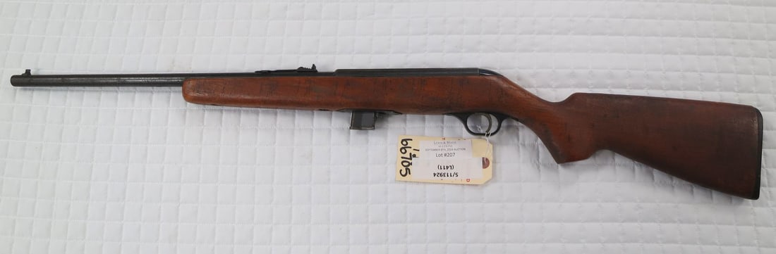 Winchester Model 67A .22 S-L-LR Rifle: Winchester Model 67A .22 S-L-LR caliber single shot bolt action rifle. Blued finish. Blade front sight. Adjustable rear sight. Wood stock. Barrrel Length 27.5" Serial # NSN. (L411)