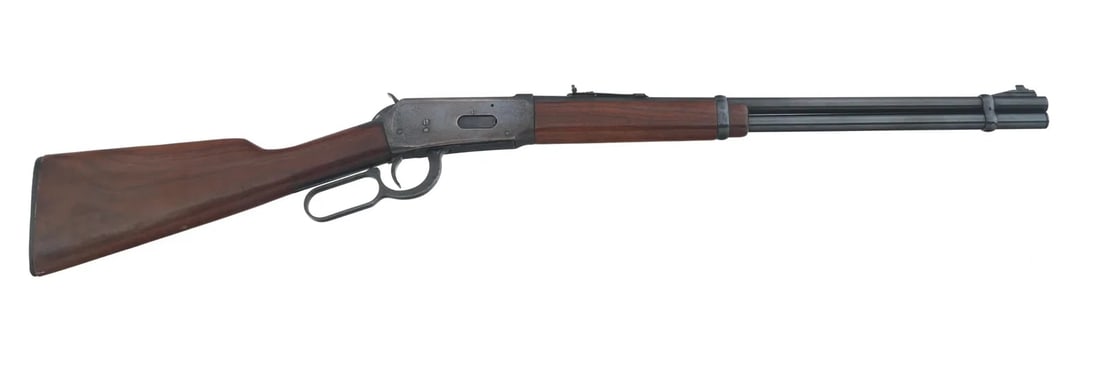 WINCHESTER MODEL 94 .30-30 WIN CALIBER RIFLE: 1973 Winchster Model 94. 30-30 Win caliber lever action rifle. Blued finish. 20" round barrel. Blade front sight. Adjustable rear sight. Wood stock. Winchester composite butt plate. Caliber / Gauge: 3