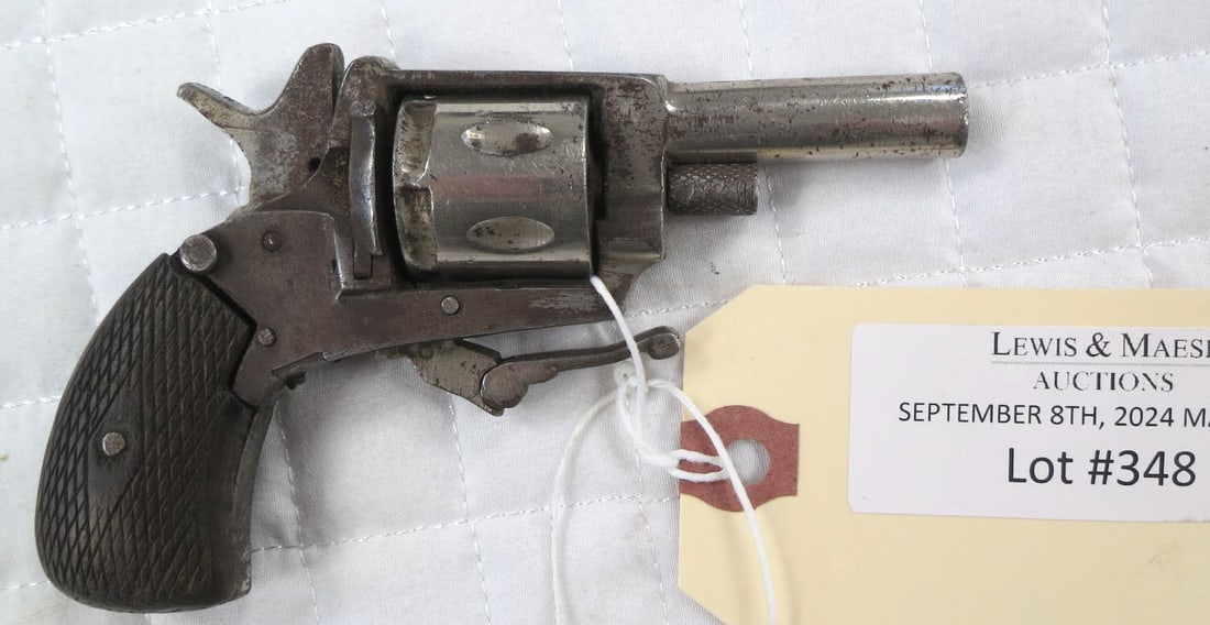 6MM REVOLVER: 6MM REVOLVER. Folding trigger revolver . 6mm caliber. Checkered wood grips. Barrel length: 2" no FFL required.