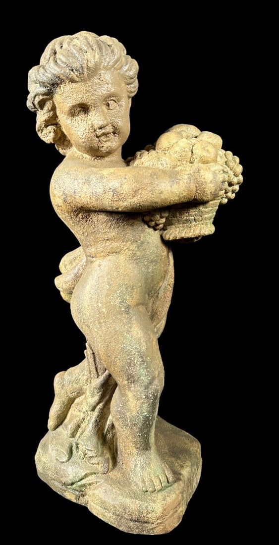 RESIN SCULPTURE OF BOY CARRYING FRUIT: RESIN SCULPTURE OF BOY CARRYING FRUIT Height: 24 in. by Width: 14.25 in. by Depth: 9.75