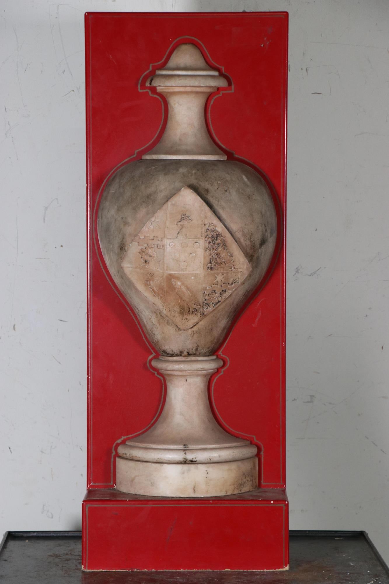 MARBLE PILASTER URN WITH THE DE MEDICI COAT OF ARMS: MARBLE PILASTER URN WITH THE DE MEDICI COAT OF ARMS. 34"H X 13"W X 8"D.
