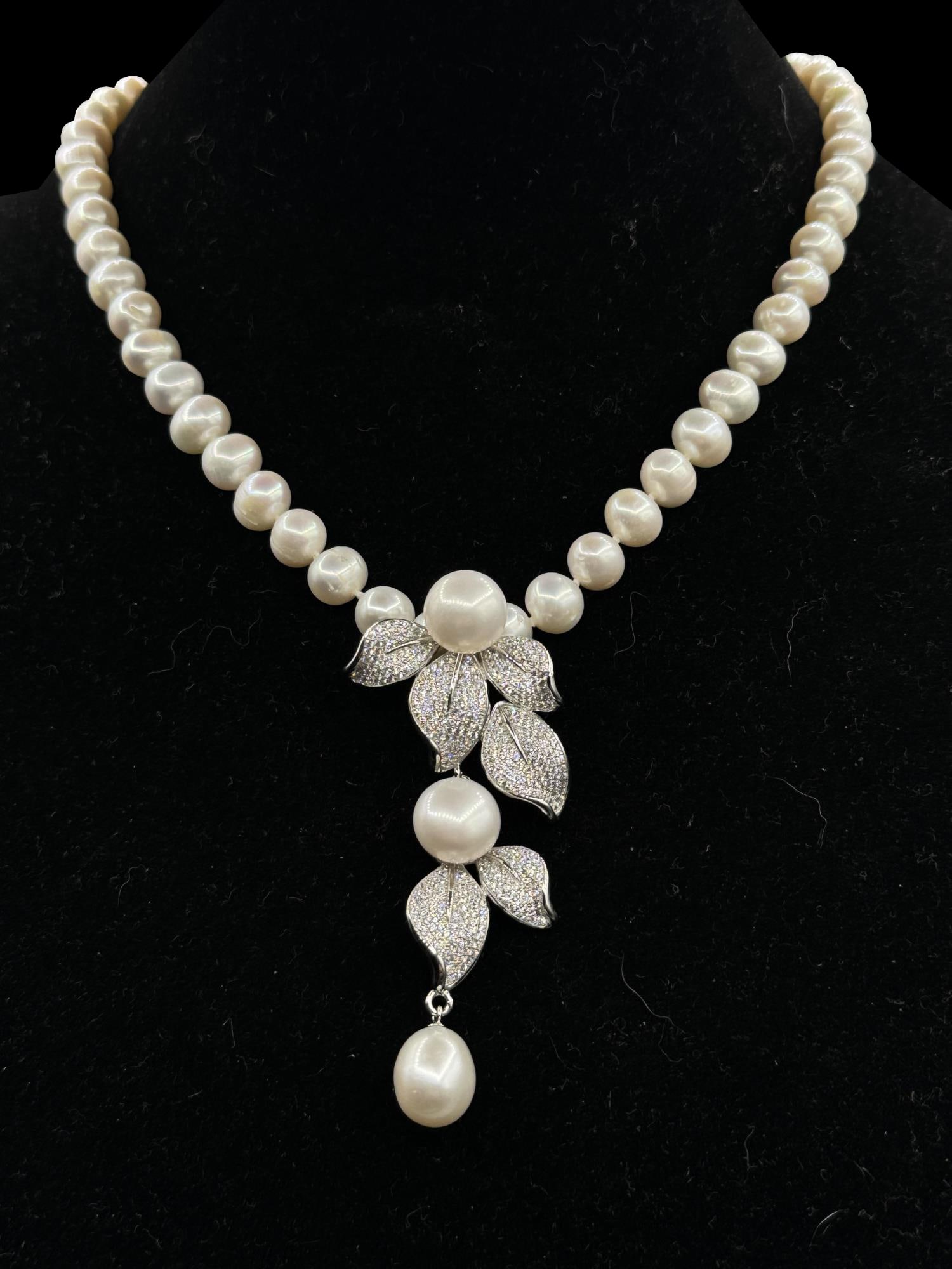 8MM PEARL NECKLACE WITH OPTIONAL CZ DIA DROP: 8MM PEARL NECKLACE WITH OPTIONAL CZ DIA DROP. 16" TOTAL LENGTH. DROP IS 3'H X 1 1/4"W X 3/4'D.