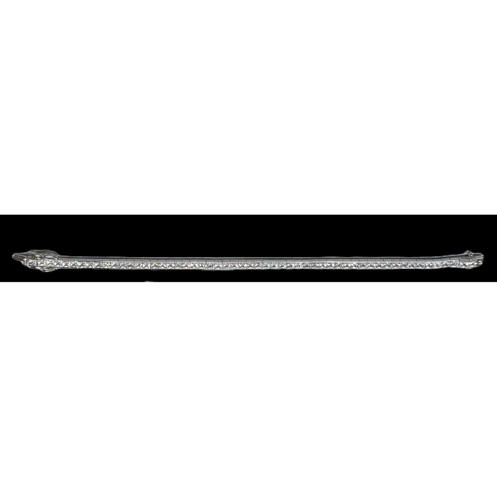 PRINCESS CUT DIAMOND STYLE STERLING TENNIS BRACELE: PRINCESS CUT DIAMOND STYLE STERLING TENNIS BRACELET in. by Width: 7 1/2 in.