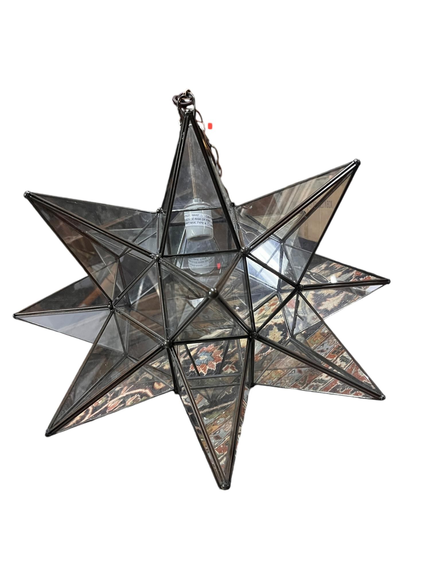METAL AND GLASS STAR LANTERN: METAL AND GLASS STAR LANTERN. Height: 22 in. by Width: 18 in.