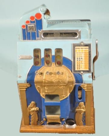 1935 MILLS SILENT GOLDEN ROMAN HEAD SLOT MACHINE: 1935 MILLS SILENT GOLDEN ROMAN HEAD 50 CENT SLOT MACHINE MADE OF CAST IRON, WOOD AND GLASS. Height: 26 in. by Width: 15.5 in. by Depth: 15 in.