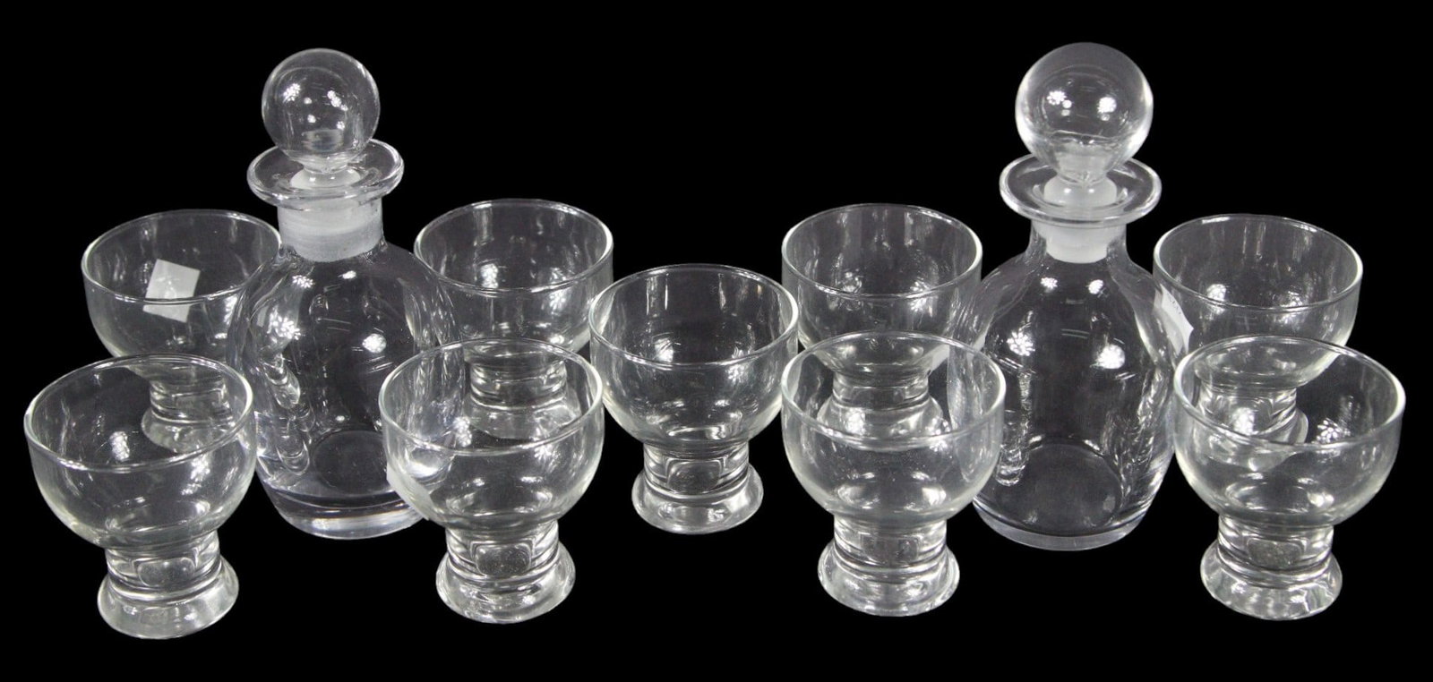 9 COCKTAIL GLASSES WITH 2 SMALL DECANTERS: 9 COCKTAIL GLASSES WITH 2 SMALL DECANTERS. Height: 65 in. by Width: 3 in. by Depth: 3 in.