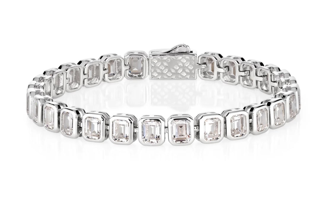 12 CARAT EMERALD CUT DIAMOND (CZ LAB) BRACELET: 12 CARAT EMERALD CUT DIAMOND (CZ LAB) BRACELET. 7 IN.