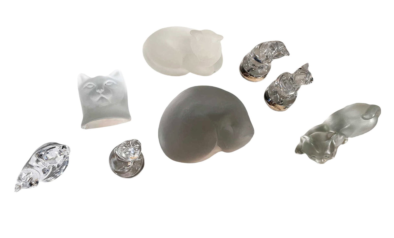 SET OF EIGHT CRYSTAL GLASS CATS: SET OF EIGHT CRYSTAL GLASS CATS. Height: 2 in. by Width: 5 in. by Depth: 4 in.