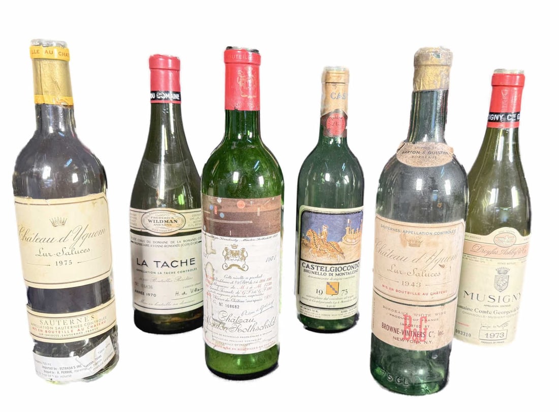 MIX LOT OF SIX COLLECTIBLE VINTAGE WINE BOTTLES: MIX LOT OF SIX COLLECTIBLE VINTAGE WINE BOTTLES; CHATEAU D'YQUEN, CHATEAU MOULON ROTHSCHILD, LA TACHE, MUSIGNY, CASTELGIOCONDO