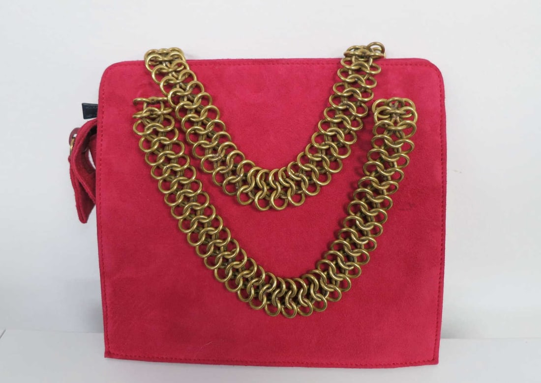 PRADA MILANO SUEDE HANDBAG: PRADA MILANO SUEDE HANDBAG. Height: 7 in. by Width: 7.5 in. by Depth: 3 in.