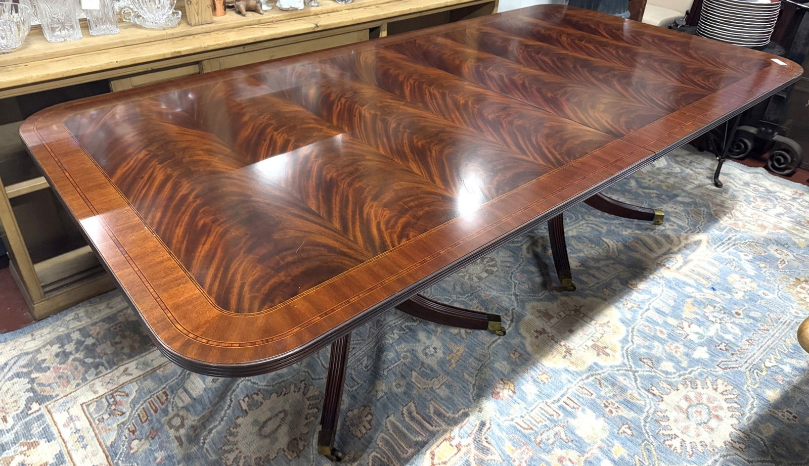 HENKEL  HARRIS TRIPPLE PEDESTAL MAHOGANY DINING TABLE WITH NICE FLAME CROTCH MAHOGANY (1 of 6)