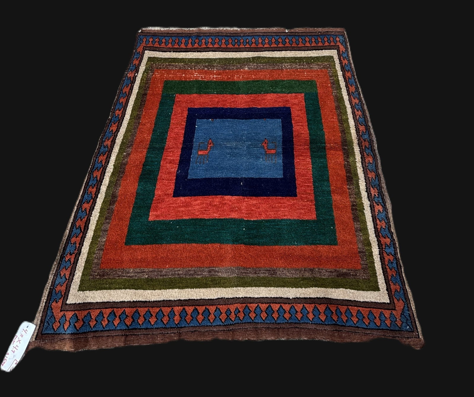 ANTIQUE HAND KNOTTED NEPAL TRIBAL RUG: ANTIQUE HAND KNOTTED NEPAL TRIBAL RUG. (13) Height: 4 ft. 9 in. by Width: 4 ft. 2 in.