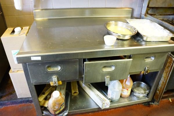 STAINLESS STEELE PREP TABLE WITH THREE DRAWERS: STAINLESS STEELE PREP TABLE WITH THREE DRAWERS.