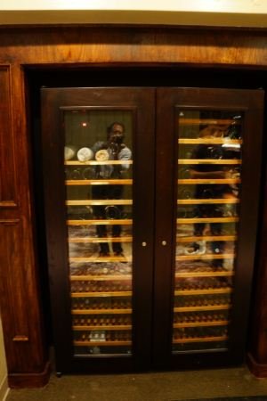 2 DOOR WINE COOLER WITH WOOD TRIM: 2 DOOR WINE COOLER WITH WOOD TRIM.