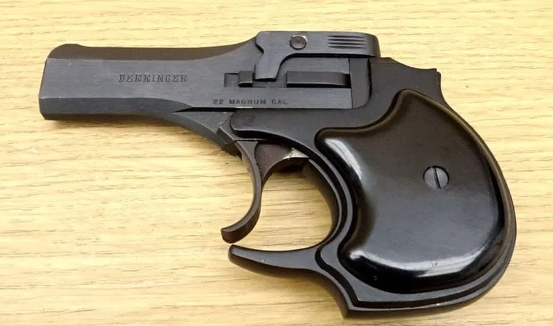 HIGH STANDARD INC. DERRINGER .22 MAGNUM Pistol: HIGH STANDARD INC. DERRINGER .22 MAGNUM Pistol.Tight Action Break Top This compact double-barreled pocket pistol packs a punch with its .22 Magnum rounds. Perfect for discreet carry or as a backup gun