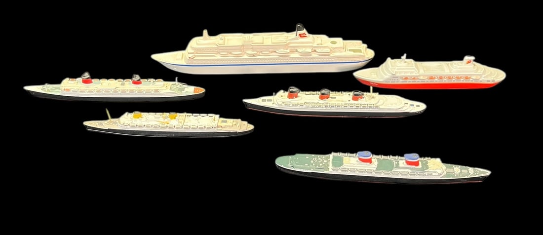 SIX ANTIQUE METAL AND PORCELAIN SHIPS: SIX ANTIQUE METAL AND PORCELAIN SHIPS. Height: 2 in. by Width: 14 in. by Depth: 1 IN.