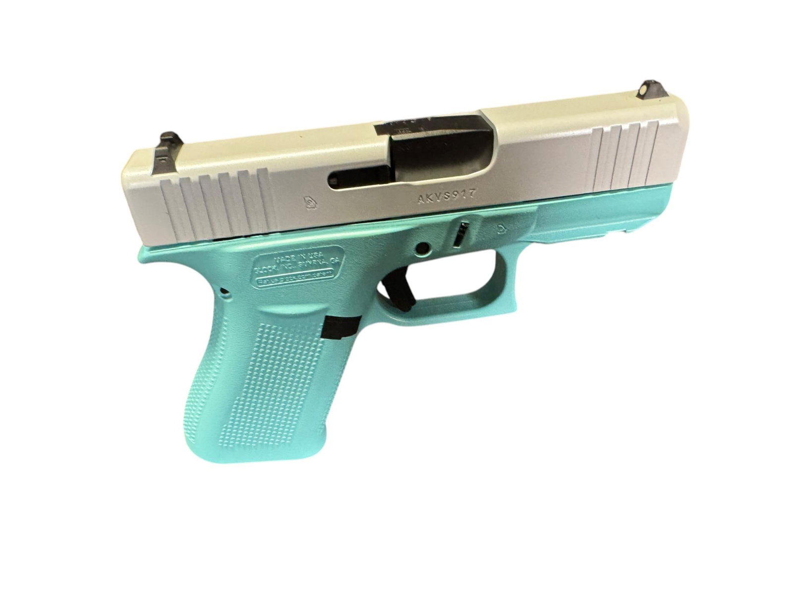 Glock G43X Sub-Compact Frame 9mm Luger: Glock G43X Sub-Compact Frame 9mm Luger 10+1 3.41" Black GMB Barrel, Pearl White Cerakote Serrated Steel Slide, Robin Egg Blue Cerakote Polymer Frame w/Beavertail, Ambidextrous. SERIAL # AKVS917 (L549)
