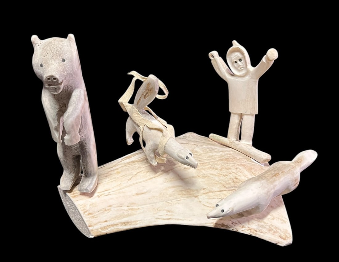 CARVED BONE ESKIMO BEAR AND FOX SCENE: CARVED BONE ESKIMO BEAR AND FOX SCENE. Height: 8 in. by Width: 10 in. by Depth: 8 in.
