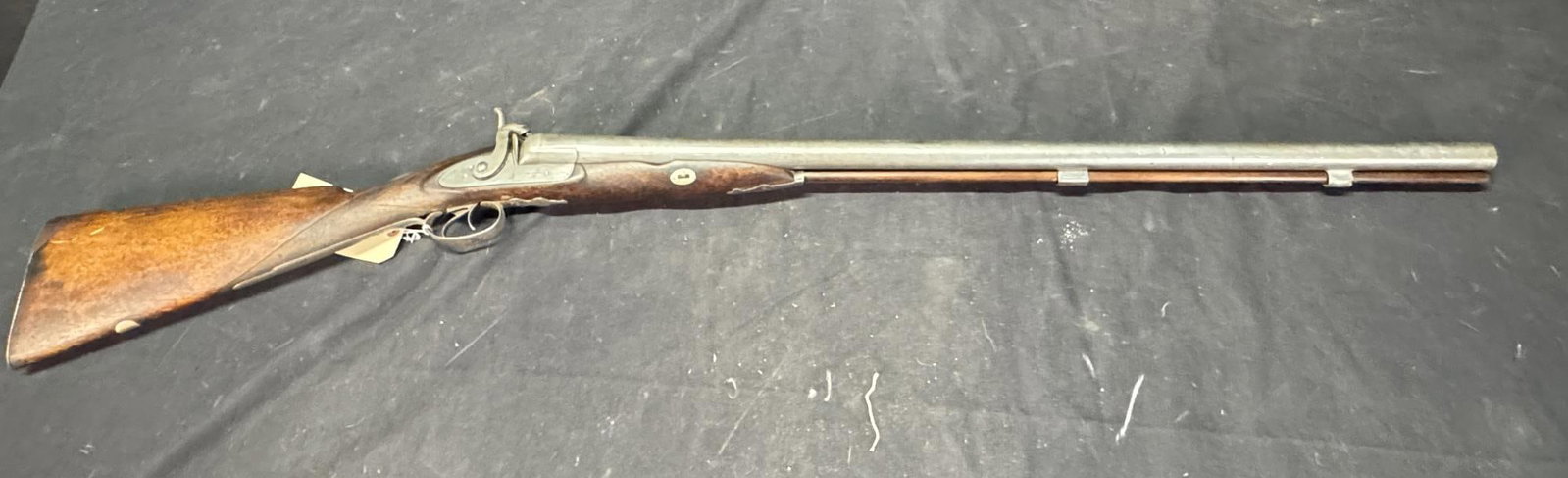 W. Richards 10 gauge side by side percussion shotg: W. Richards 10 gauge side by side percussion shotgun. Barrel stamped "London Fine Twist". Wood stock. Bead front sight. Ram rod. 33" BARREL ANTIQUE.