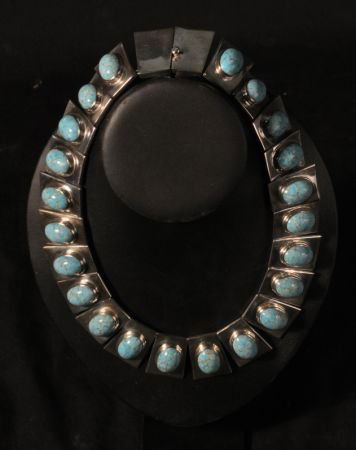 TURQUOISE AND STERLING SILVER NECKLACE: TURQUOISE AND STERLING SILVER NATIVE AMERICAN NECKLACE.