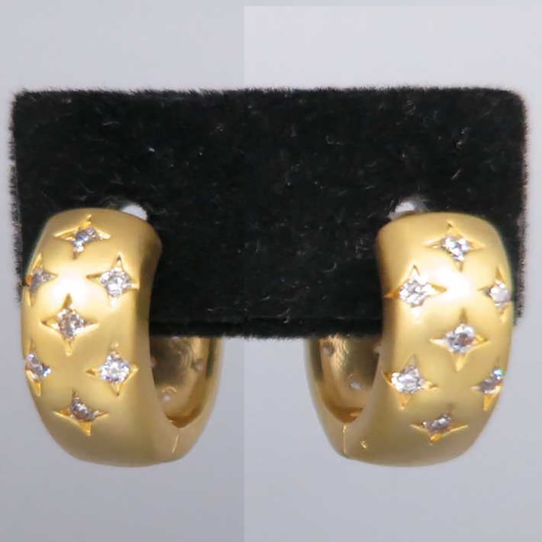 PAIR OF MATTE GILT BRASS CZ STAR EARRINGS (1 of 4)