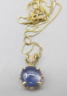 14KT GOLD DIAMOND & BLUE SAPPHIRE PENDANT/CHAIN: 14KT YELLOW GOLD DIAMOND & BLUE STAR SAPPHIRE PENDANT/CHAIN. THE DIAMOND IS .07CT & SI=CLARITY. THE 4 CT BLUE STAR SAPPHIRE IS SUSPENDED FROM AN 18 INCH CHAIN. 3.9 GRAMS T.W.