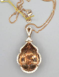 14KT Rose Gold Morganite & Diamond Pendant.: 14KT Rose Gold Morganite & Diamond Pendant. 14KT Rose Gold pendant marked Oscar Friedman. 16" Chain. 14.06 grams t.w. Height: 1.5 in. by Width: 3/4 in. by Depth: 1/2 in.