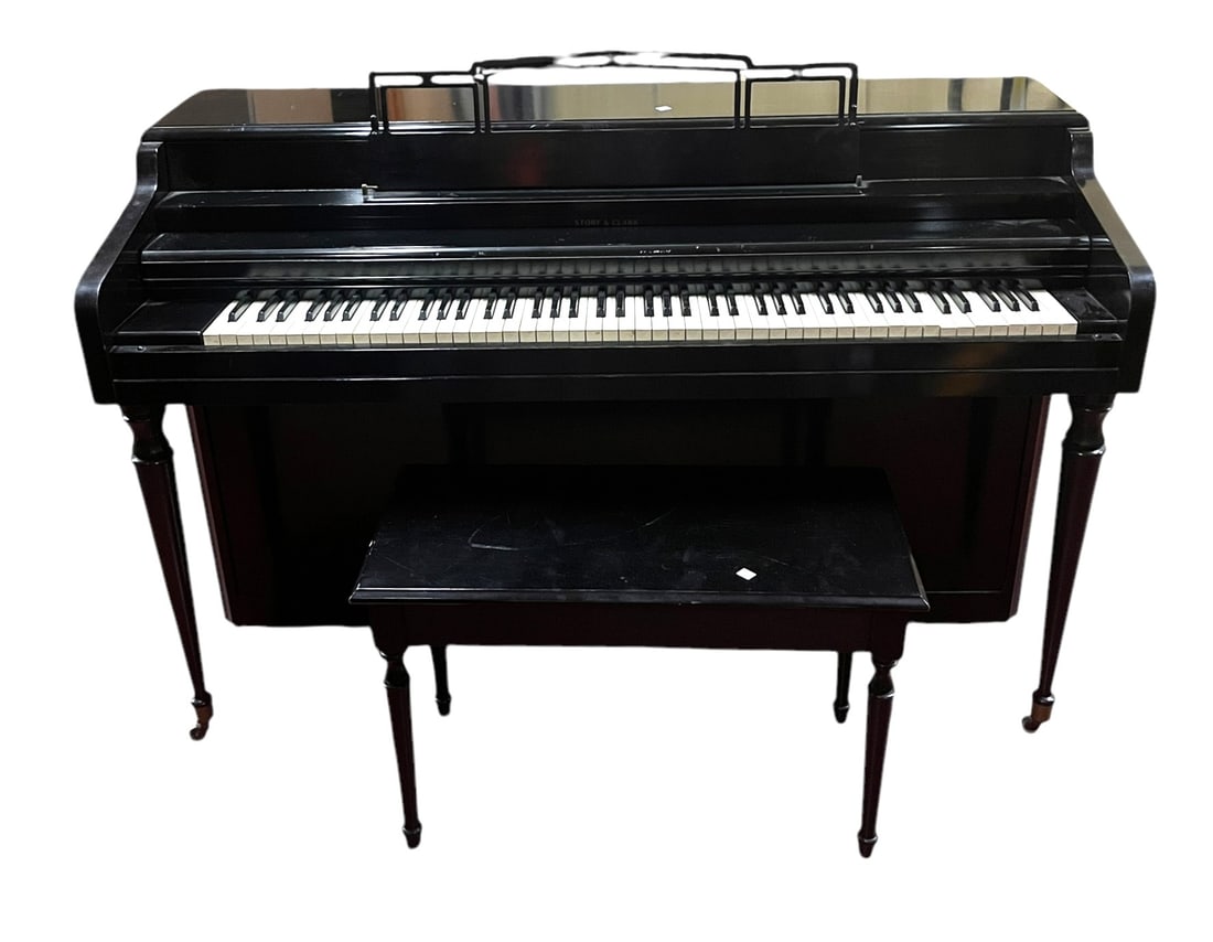 STORY AND CLARK PIANO AND BENCH: STORY AND CLARK PIANO AND BENCH. Height: 38.5 in. by Width: 58 in. by Depth: 24 in.