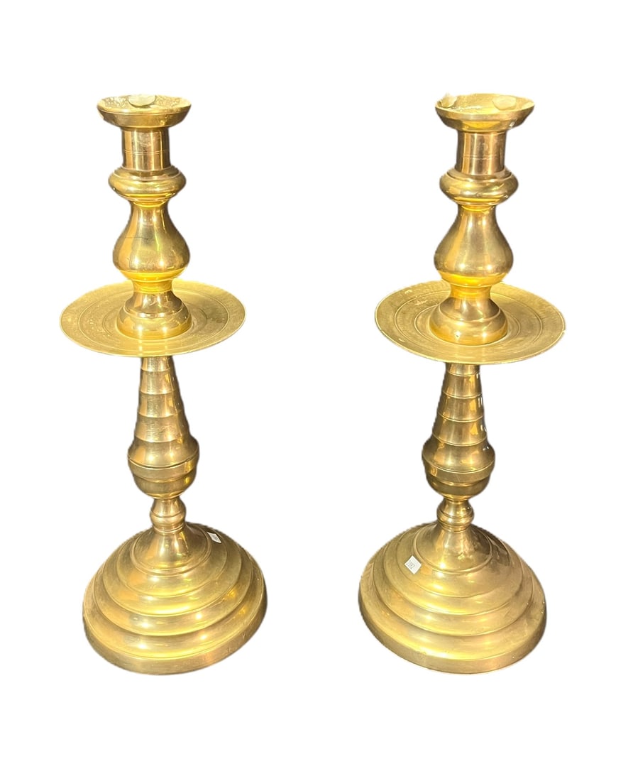 PAIR OF ANTIQUE BRASS CANDLESTICKS: PAIR OF ANTIQUE BRASS CANDLESTICKS. Height: 19 in. by Width: 8 in. by Depth: 8 in.
