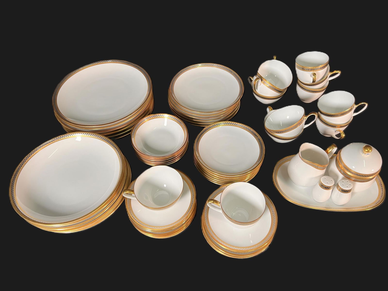 Olivia Hutschenreuther china set: Olivia Hutschenreuther china set. 6 Dinner Plates, 6 salad/Luncheon plates, 6 soup/salad bowls, 6 bread plates, 6 coffee cups and saucers, 6 tea cups and saucers, six fruit bowls, 1 small tray, cream
