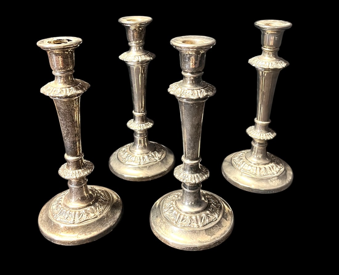 FOUR VINTAGE SILVER PLATED CANDLESTICKS (1 of 3)