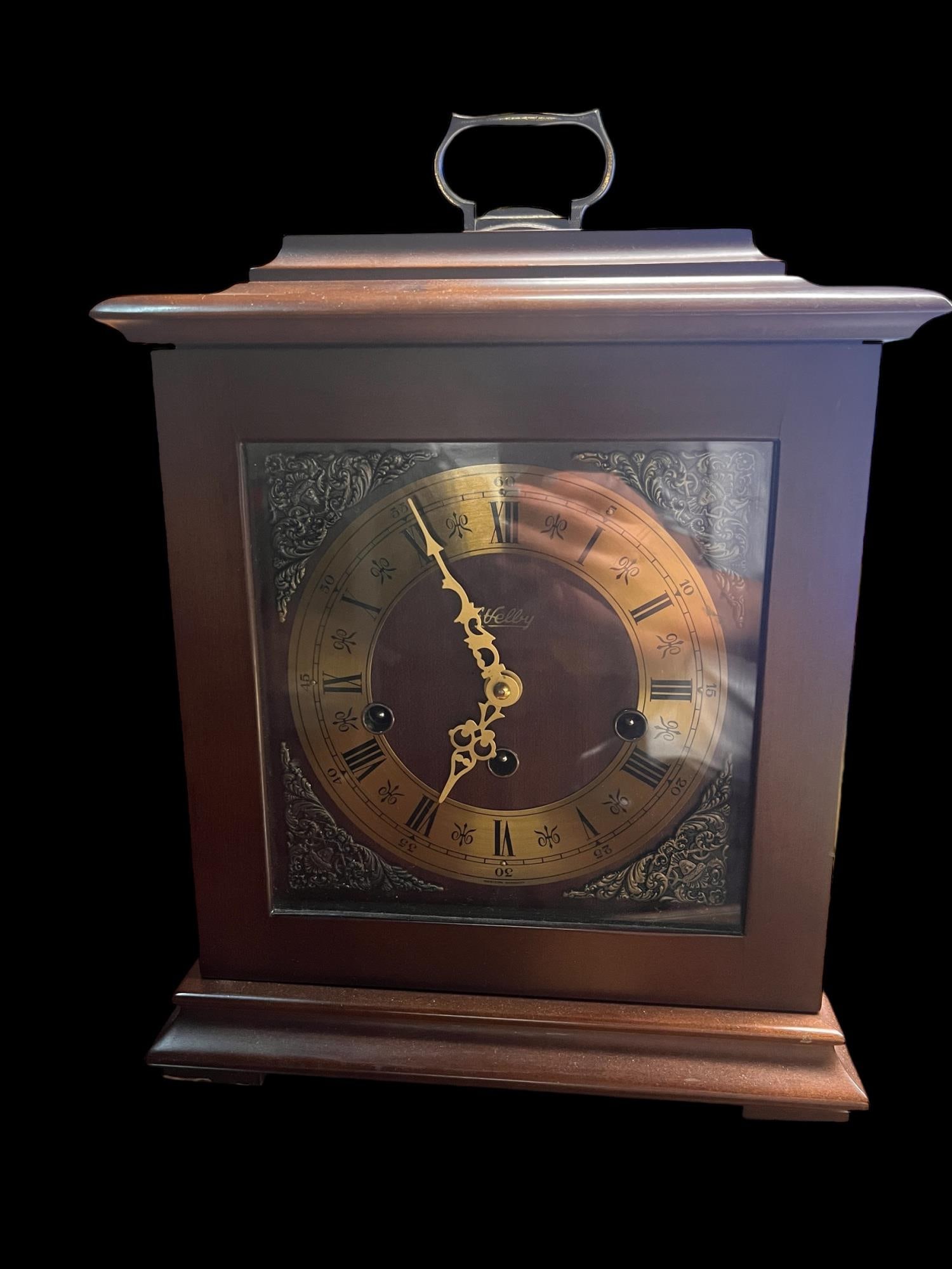 WALNUT MANTLE CLOCK: WALNUT MANTLE CLOCK. Height: 13 in. by Width: 10 in. in. by Depth: 7.5 in.