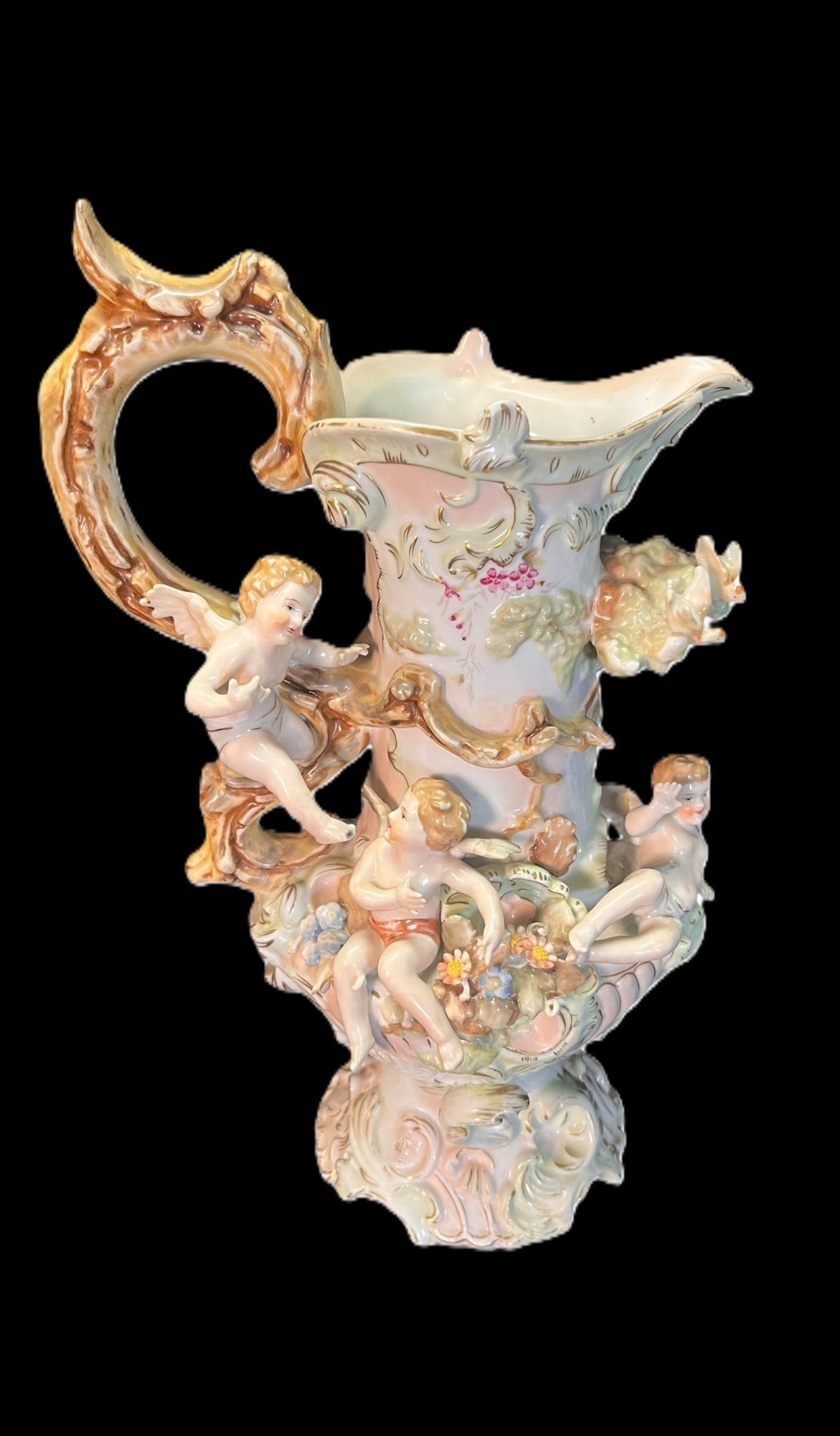 ANTIQUE MEISSEN PITCHER WITH CHERUB: ANTIQUE MEISSEN PITCHER WITH CHERUB Height: 13 in. by Width: 8.5 in. by Depth: 5 IN.