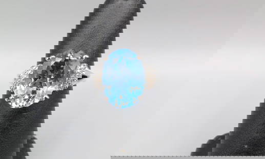 SKY BLUE & WHITE TOPAZ STERLING SILVER RING: SKY BLUE & WHITE TOPAZ STERLING SILVER SIZE SEVEN RING.