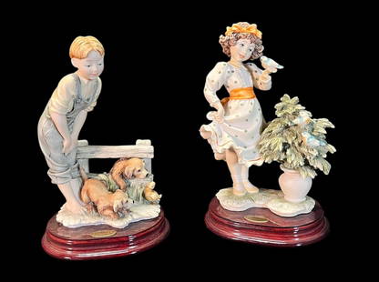 SET OF TWO GIUSEPPE ARMANI FIGURES: SET OF TWO GIUSEPPE ARMANI FIGURES Height: 9.5 in. by Width: 6 in. by Depth: 5 IN.