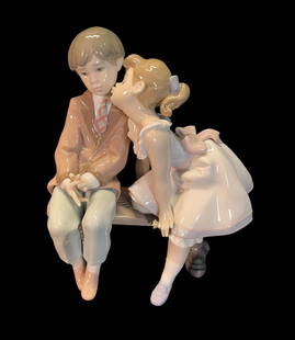 LLADRO SPAIN CERAMIC FIGURES ON BENCH: LLADRO SPAIN CERAMIC FIGURES ON BENCH Height: 8.5 in. by Width: 7.5 in. by Depth: 5 IN.