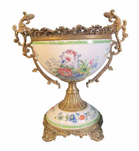CHINESE FLORAL SEVRES PORCELAIN CENTERPIECE: CHINESE FLORAL SEVRES PORCELAIN GILT BRONZE MOUNTED CENTERPIECE. Height: 10 in. by Width: 11.5 in. by Depth: 11.5 in.