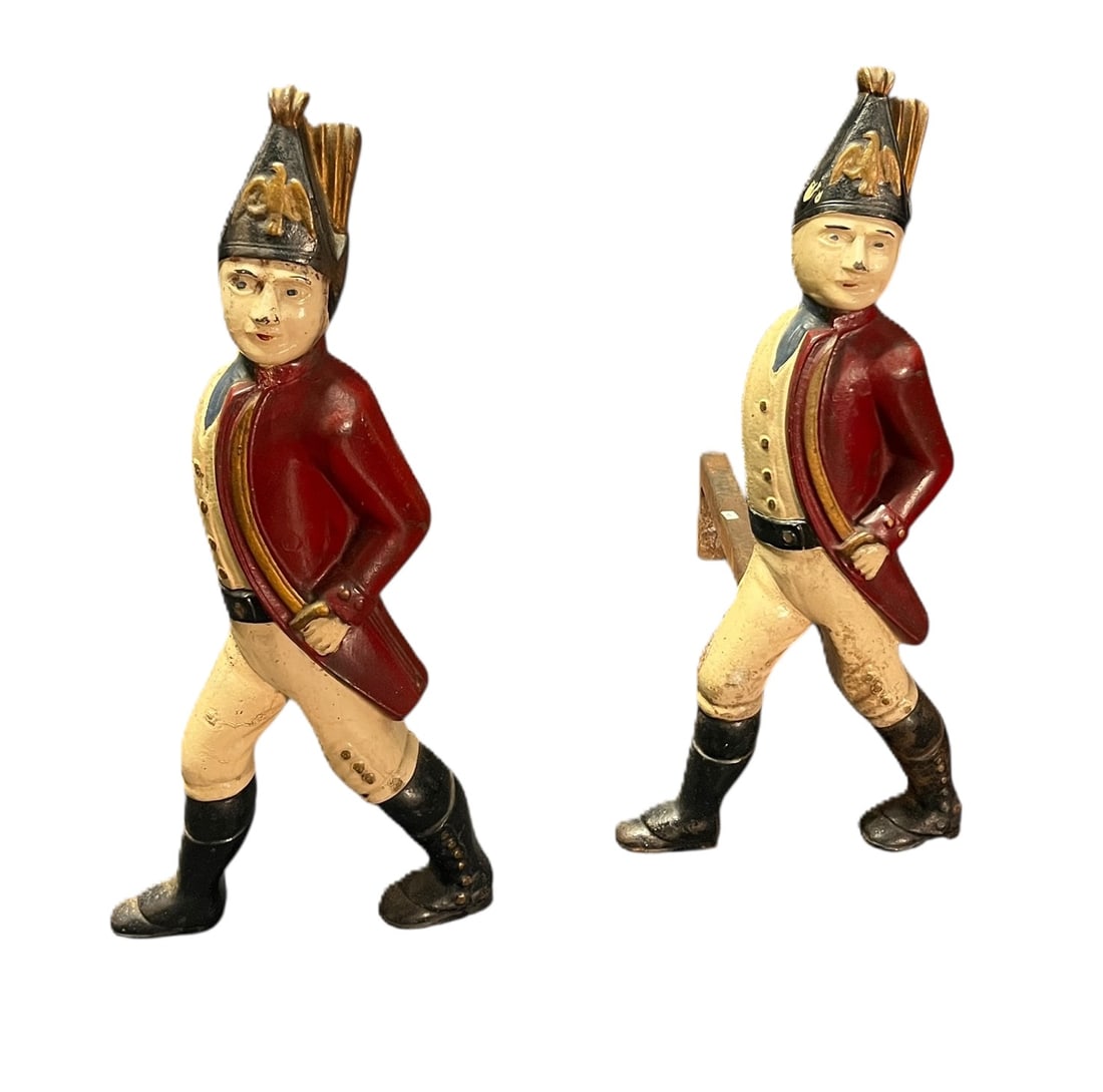 PAIR OF ANTIQUE HESSIANS SOLIDERS CAST IRON ANDIRONS: PAIR OF ANTIQUE HESSIANS SOLIDERS CAST IRON ANDIRONS Height: 20 in. by Width: 9 in. by Depth: 21 in.