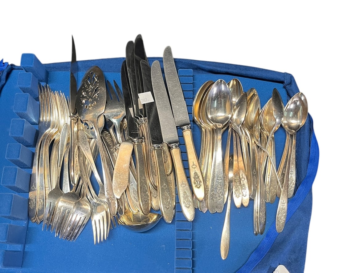 SET OF SILVER PLATE UTINSILS (1 of 8)