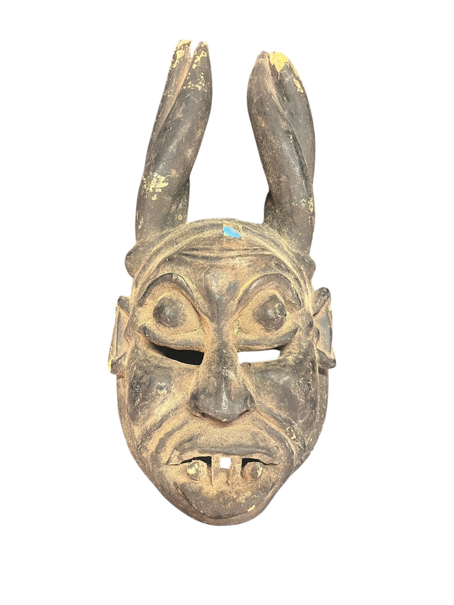 PRECOLUMBIAN AFRICAN CARVED TRIBAL MASK: PRECOLUMBIAN AFRICAN CARVED TRIBAL MASK Height: 19 in. by Width: 9.5 in. by Depth: 6 in.