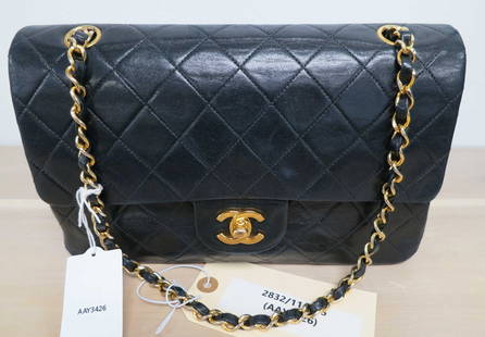 Chanel Classic Double Flap Shoulder Bag: Chanel Classic Double Flap Shoulder Bag in Black Quilted Lambskin Leather Interlaced Chain with Black Leather Handles Gold Hardware. 1944851 (1989-1991) France. AAY3426 Height: 6 in. by Width: 10 in.